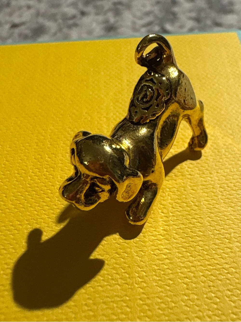 Tiny brass gold dog figurine